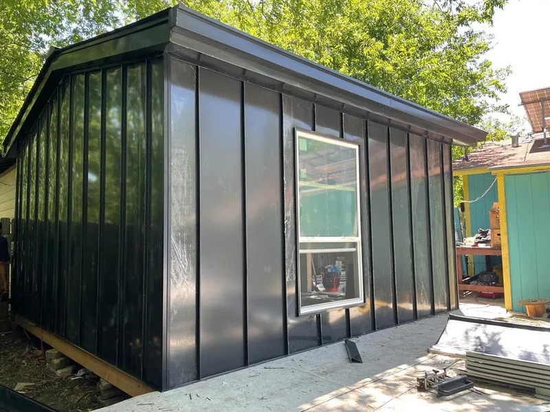 Black standing seam metal wall panels for Roof Inspection in Fayetteville